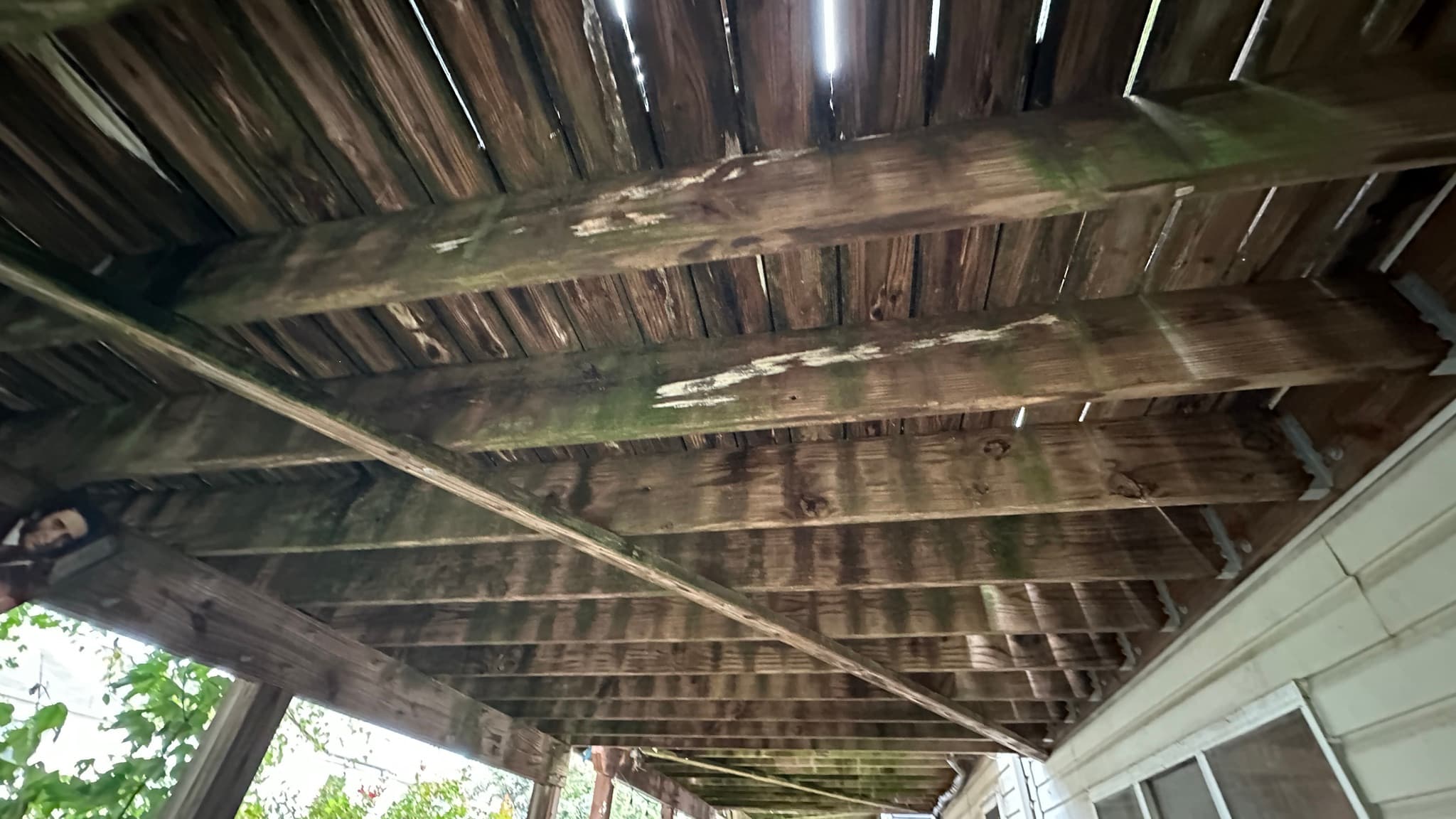 Gunners Lake Village, Germantown MD — Underside of the rear deck — weathered framing