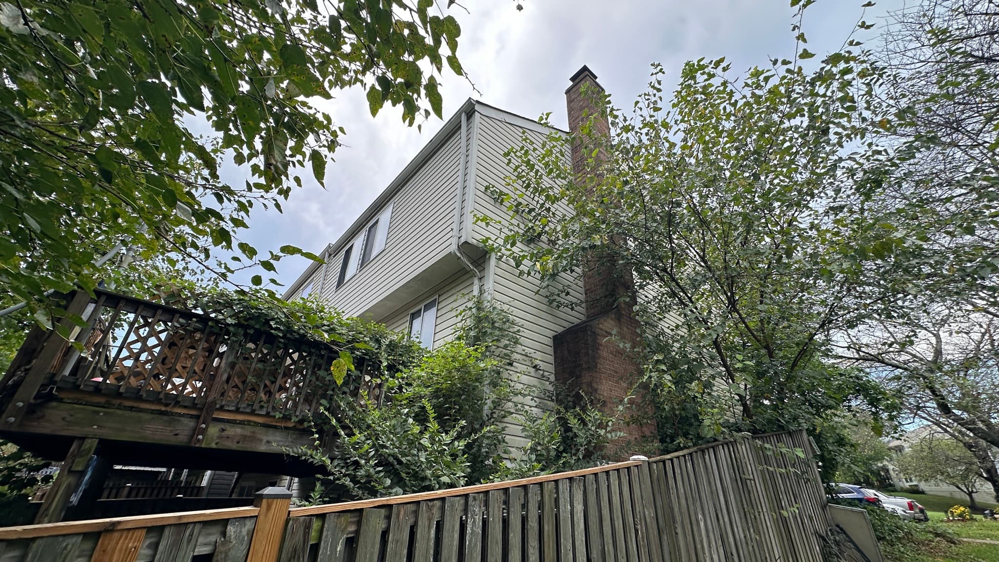Gunners Lake Village, Germantown MD — Side and rear exterior — deck and chimney
