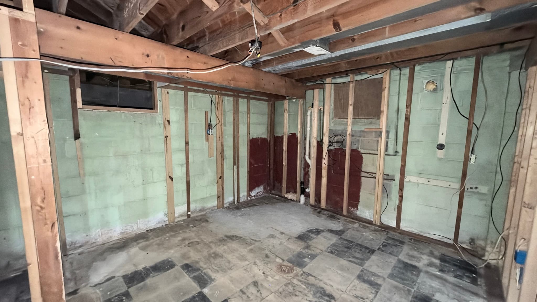 Lower level — walls open to the block