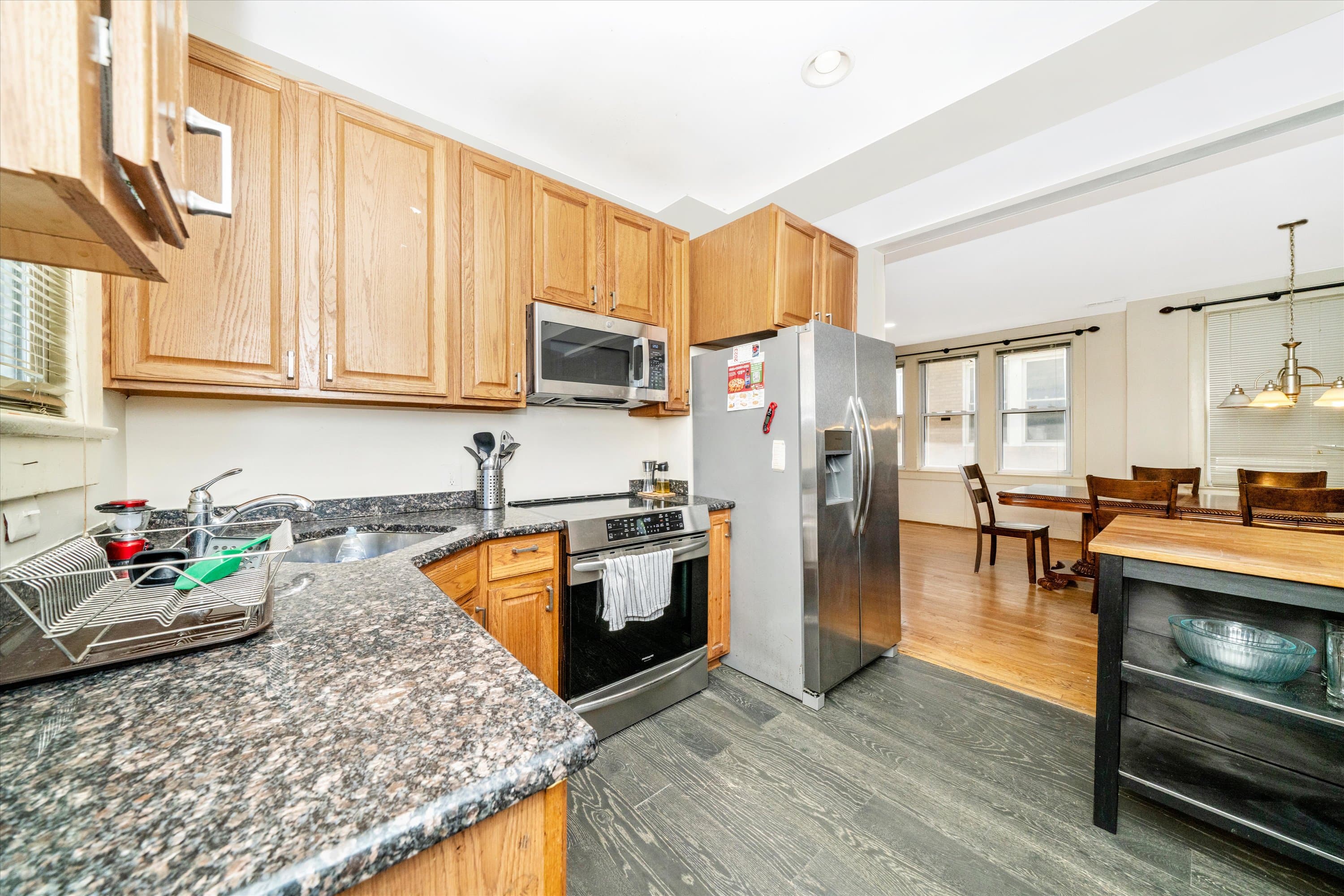 Kitchen detail showing cabinetry and counter space at 3034 South Dakota Ave NE