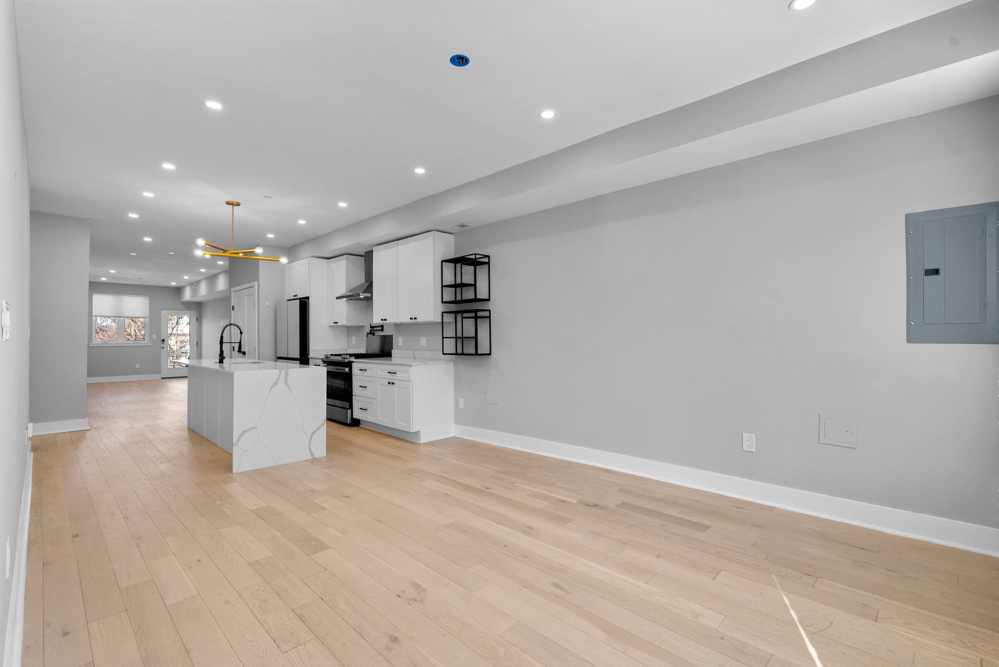 Skylit primary bathroom with double vanity at 3572 13th St NW #2